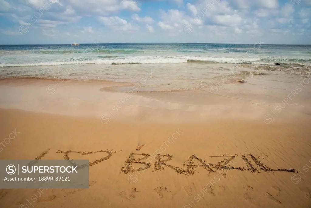 I love brazil written in the sand at praia do boldro;Fernando de noronha pernambuco brazil