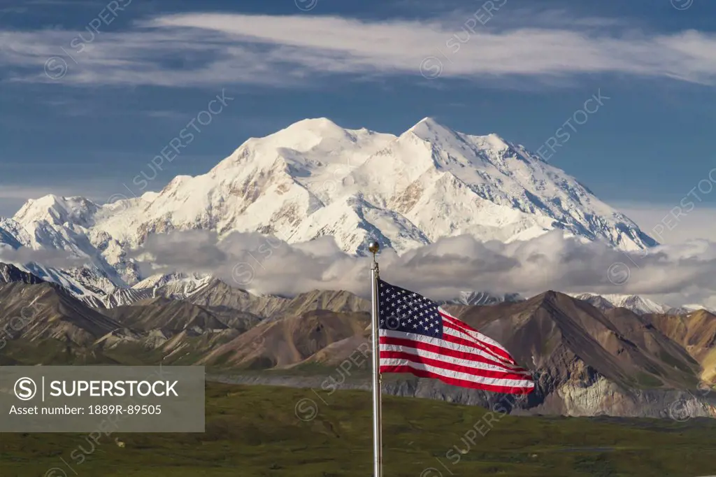 Mt. McKinley from Eielson Visitor Center with American flag in foreground, Denali National Park and Preserve, Interior Alaska, Summer