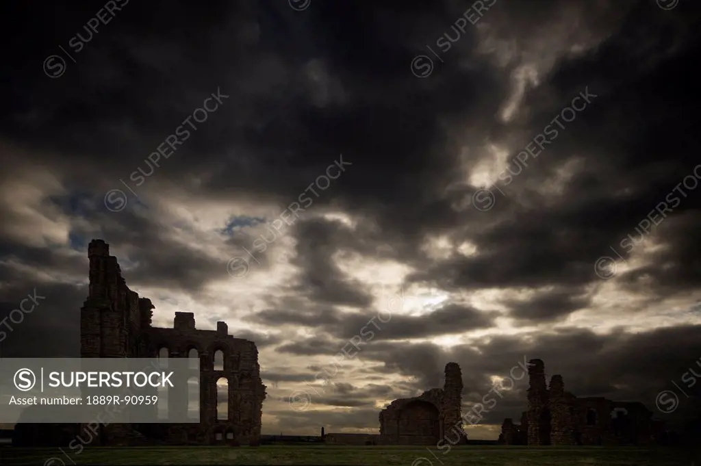 Tynemouth priory under dark storm clouds;Tynemouth tyne and wear england