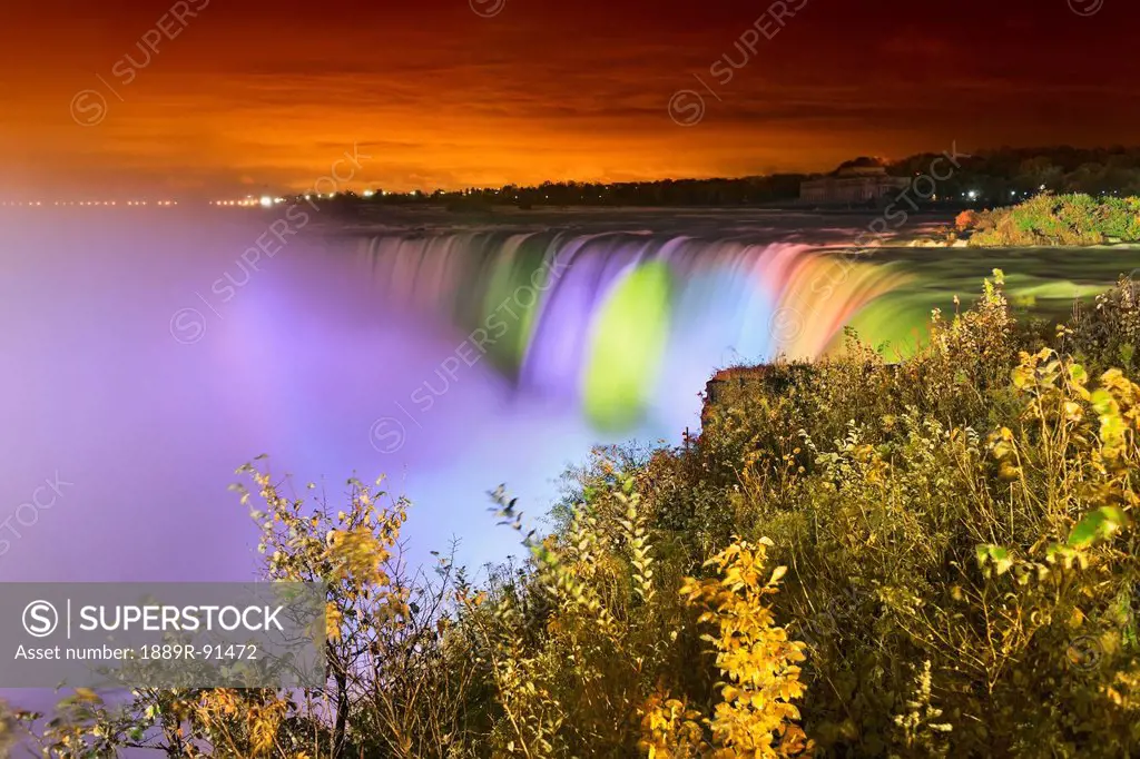Horseshoe Falls lit up at night; Niagara Falls, Ontario, Canada