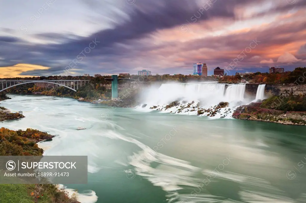 American Falls and Niagara River at dusk; Niagara Falls, New York, United States of America