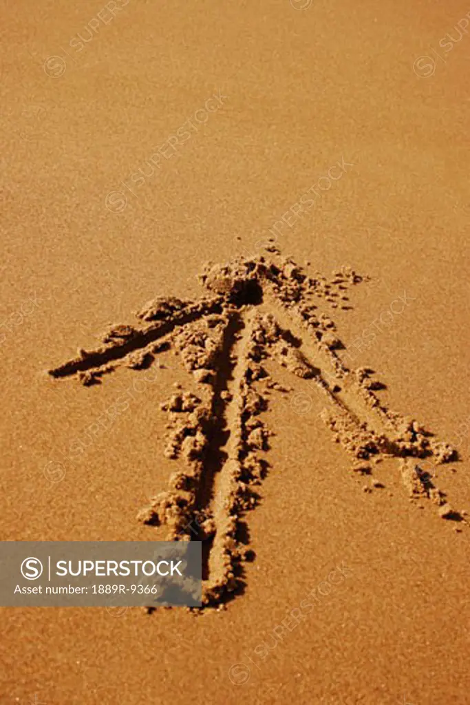 Arrow written in sand