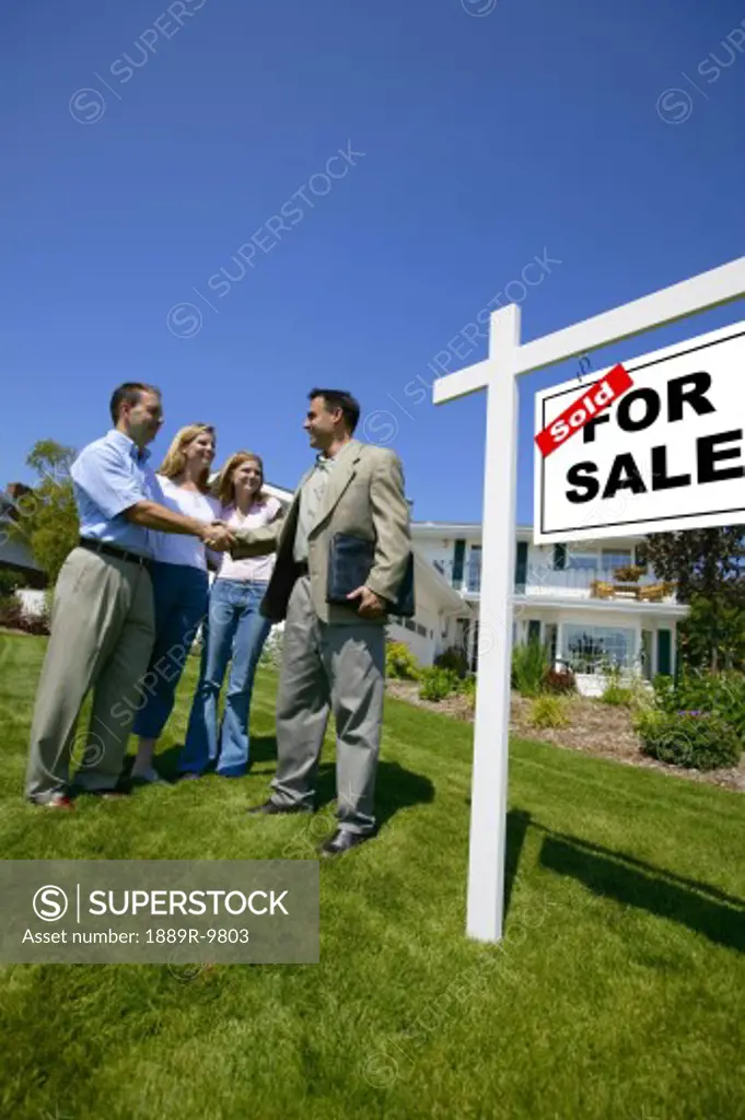 Shaking hands with realtor