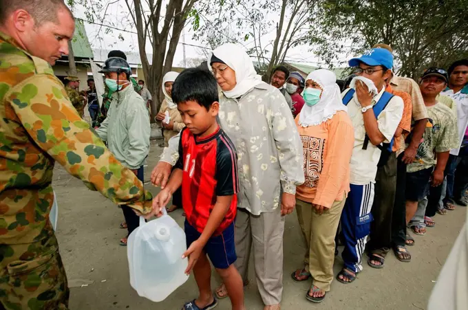 Australian armed forces brought a large water purification plant to supply clean drinking water after the Indian Ocean tsunami in 2004; Aceh Province,...