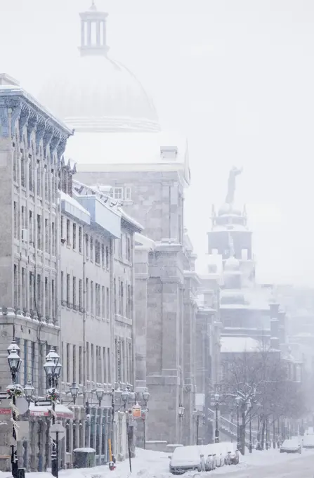 Snow-Covered De La Commune Street In Old Montreal; Montreal Quebec Canada