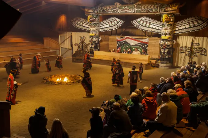 Tsasala Cultural Group perform a traditional dance in Alert Bay Big House on Cormorant Island, Queen Charlotte Strait, BC, Canada; British Columbia, Canada