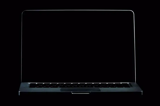 Laptop computer with a dark screen, tarifa cadiz andalusia spain