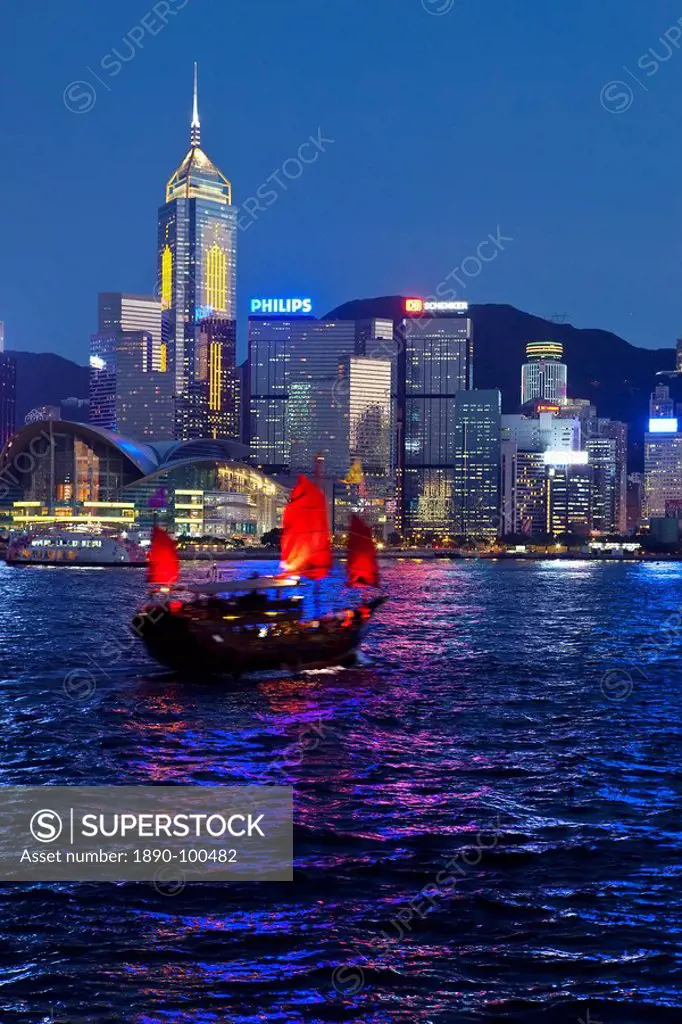 View from Kowloon of one of the last remaining Chinese sailing junks on Victoria Harbour, Hong Kong, China, Asia