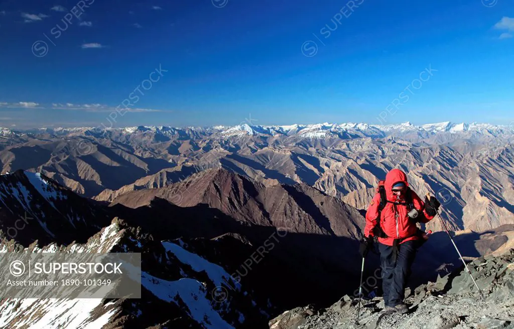 A climber makes her way up the summit ridge of Stok Kangri at 6137 metres, a popular and easily accessible trekking peak in the northern Zanskar Range...