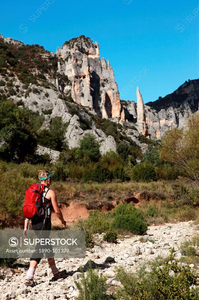 Woman hiking in the Mascun Gorge, one of Europe´s most popular canyoning destinations, Sierra de Guara mountains, Aragon, Spain