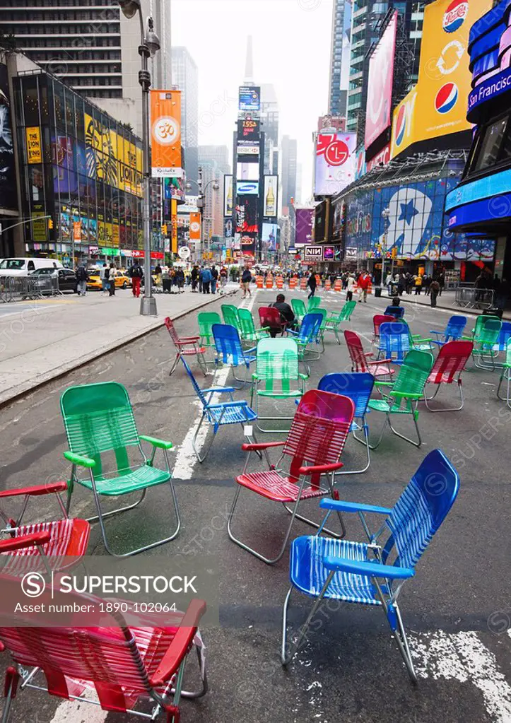 Garden chairs in the road for the public to sit and relax in the pedestrian zone, Times Square, New York City, New York, United States of America, Nor...