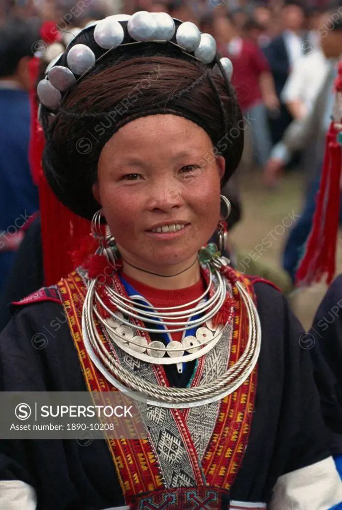 Young Miao woman in finery of silver, Pingtang, Guizhou, China, Asia
