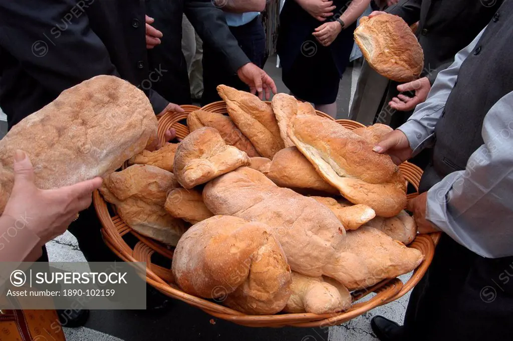 Bread distribution during Espiritu Santo Festival, Vila Nova, Azores, Portugal, Europe