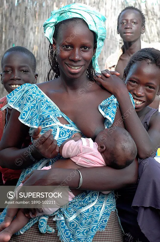 Young mother breast feeding, Ndiobene Talleine, Kaolack, Senegal, West Africa, Africa