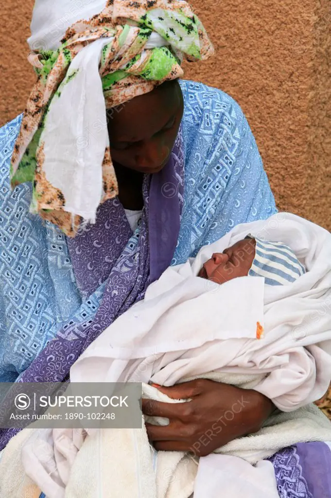 Mother holding her crying baby, Keur Moussa, Senegal, West Africa, Africa