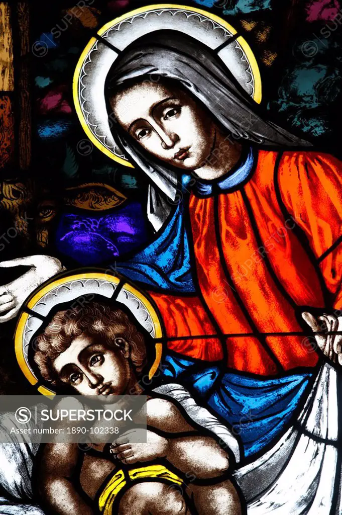 Stained glass window of Virgin and Child, St. Mary´s church, New York, United States of America, North America