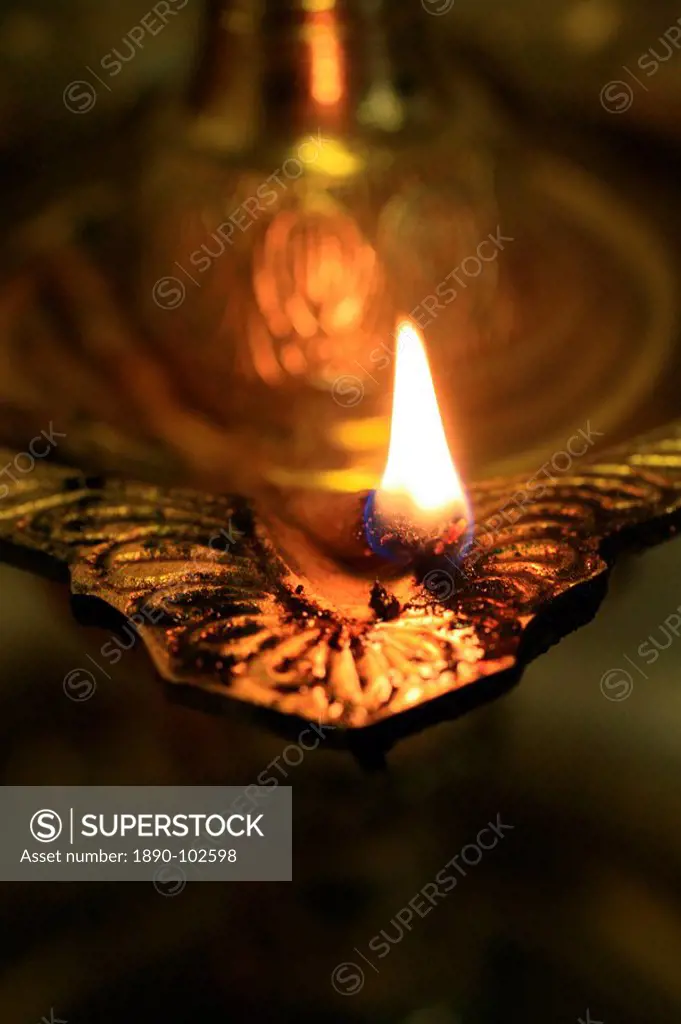 Oil lamp in Hindu temple, Paris, France, Europe
