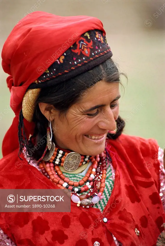 Portrait of a Tajik woman with hat and jewellery at Tashkurgan, Xinjiang, China, Asia