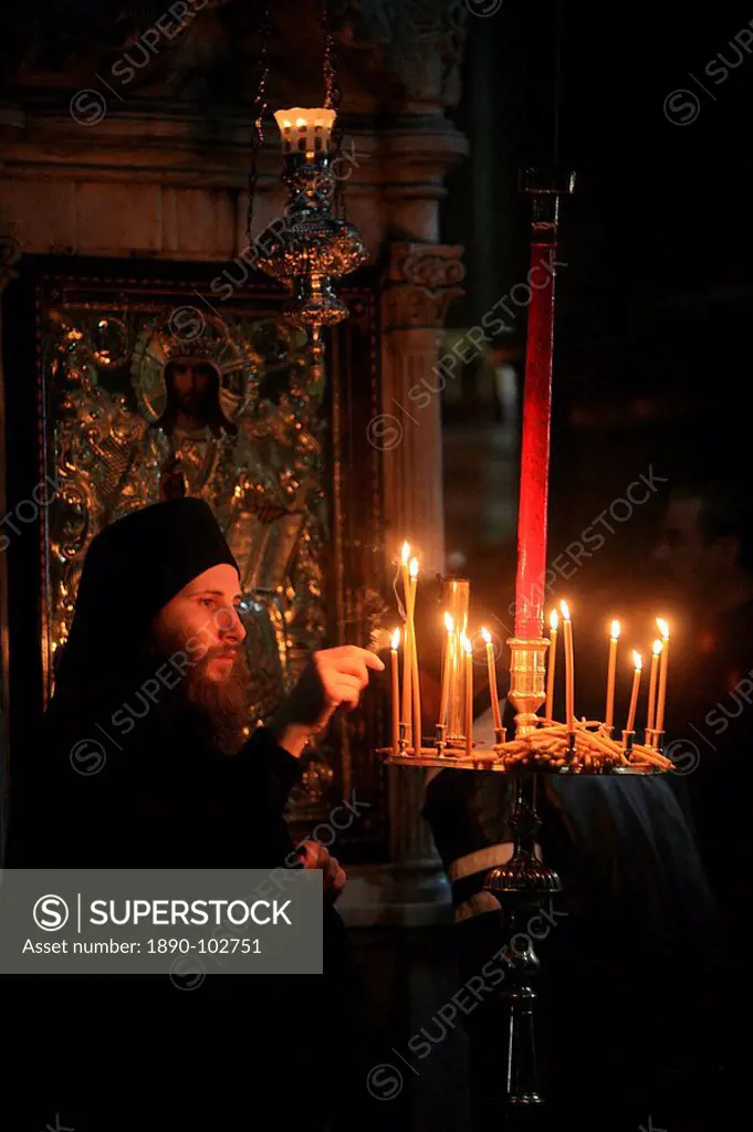 Orthodox monk in Aghiou Pavlou monastery church on Mount Athos, Greece, Europe