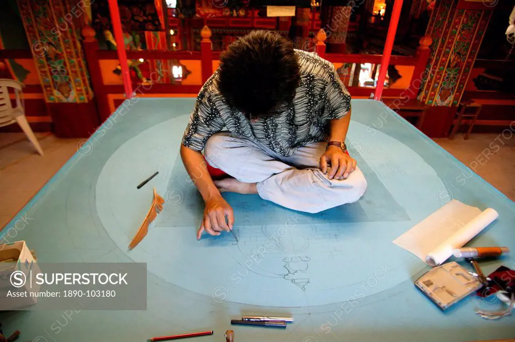 Drawing a mandala in the Temple of the Thousand Buddhas, Dashang Kagyu Ling congregation, Toulon sur Arroux, Saone et Loire, France, Europe