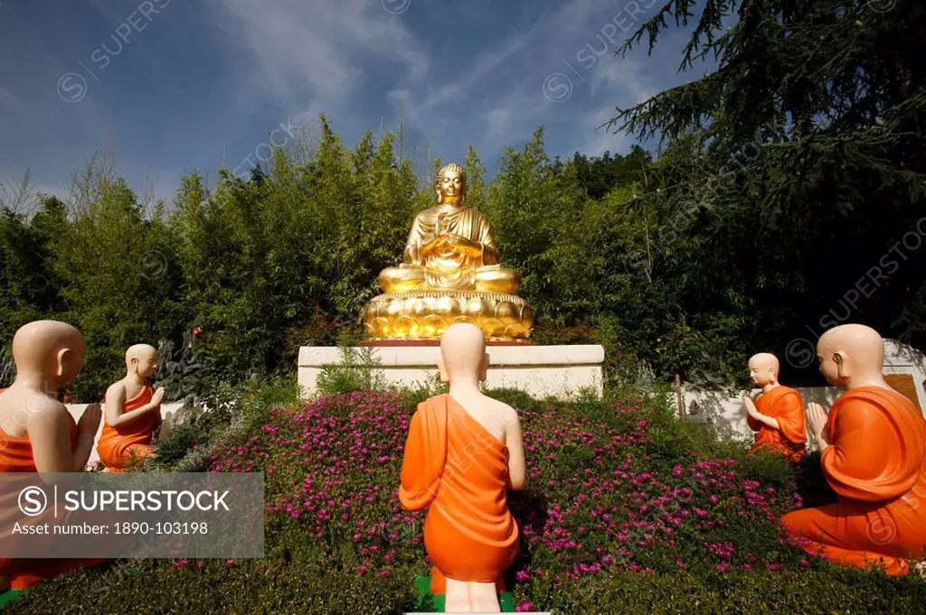 Statues of Buddha with his disciples in Benares, Sainte_Foy_Les_Lyon, Rhone, France, Europe