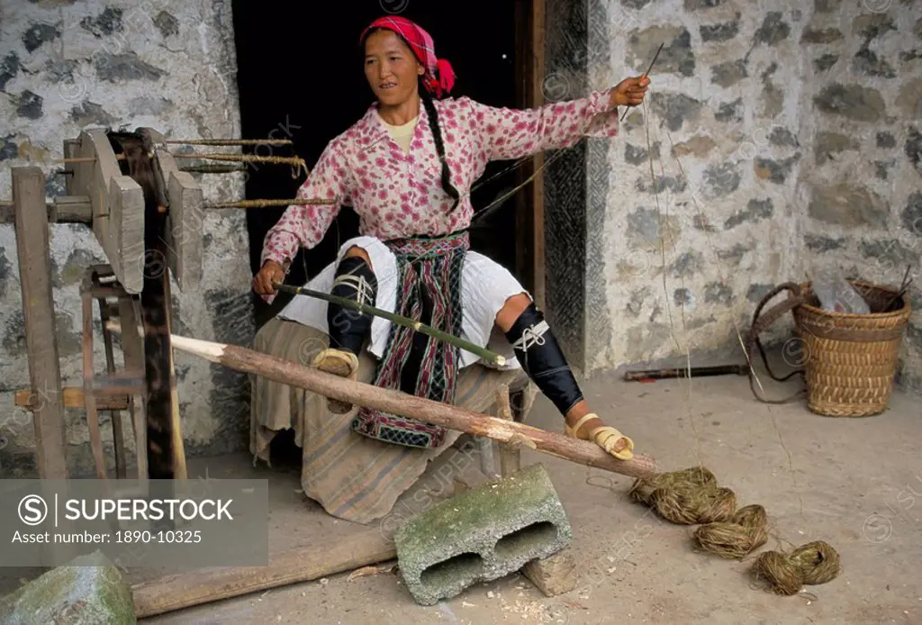 Woman twisting hemp, North Guangxi, China, Asia