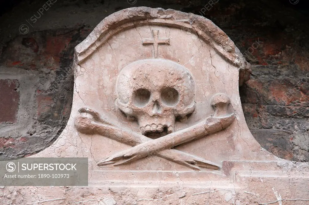 Sculpture of skull and crossed bones outside Frauenkirche, Munich, Bavaria, Europe