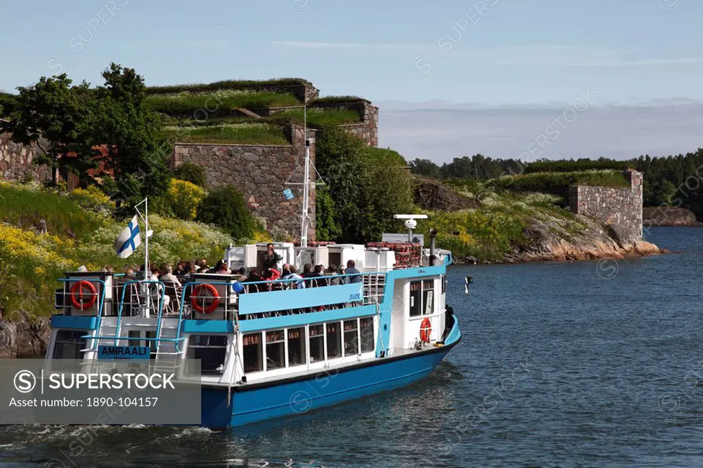 Ferry to Helsinki, with historic Fortress walls in the background, UNESCO World Heritage Site, Suomenlinna Island, Helsinki, Finland, Scandinavia, Eur...