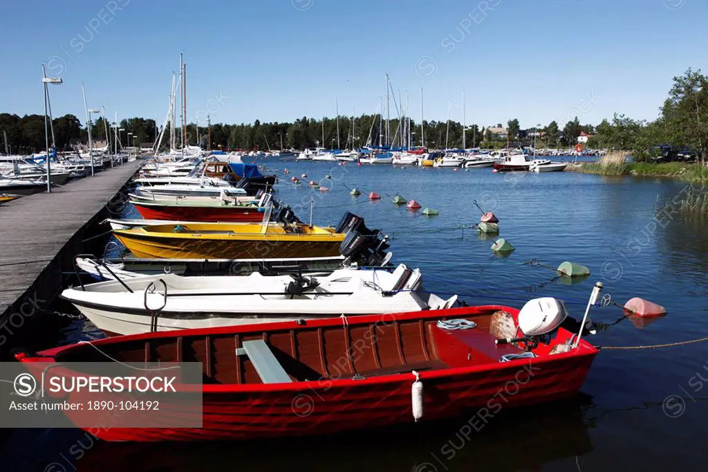Motor boats moored at jetty in the marina, Syaraumanlahti Bay, Gulf of Bothnia, Rauma, Satakunta, Finland, Scandinavia, Europe