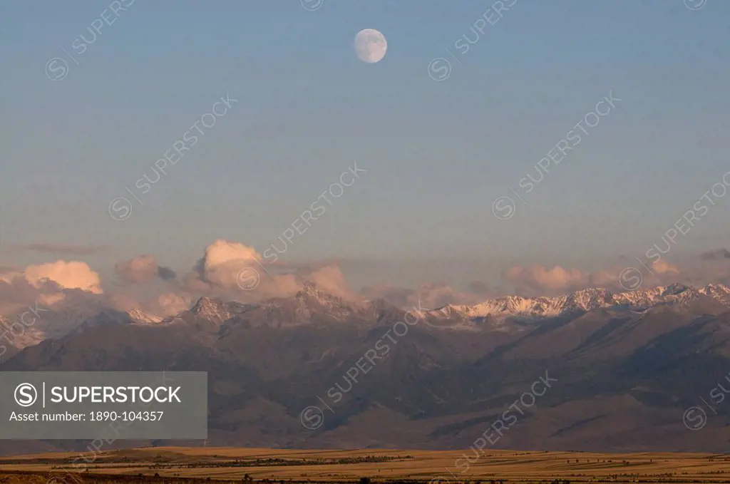 Full moon above the central Tian Shan mountain range, Kyrgyzstan, Central Asia, Asia