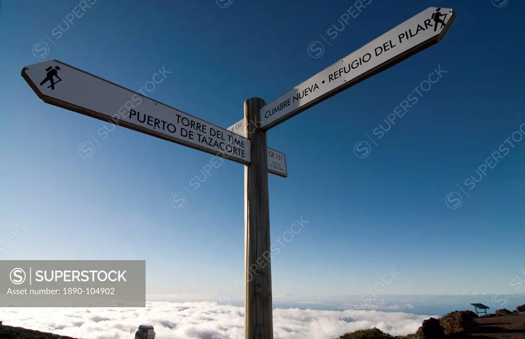 Signpost for trekkers above the clouds on top of the Taburiente, Canary Islands, Spain, Europe