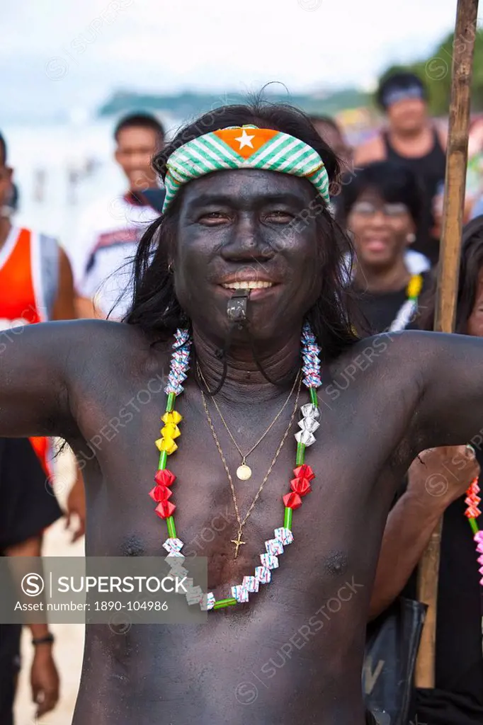 Man covered in black soot, Ati_Atihan Parade along White Beach, during the annual Ati_Atihan Festival, Boracay, Aklan, Philippines, Southeast Asia, As...