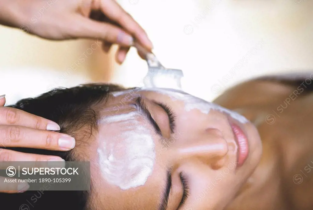 Woman having a facial, Kirana Spa, Indonesia, Southeast Asia, Asia