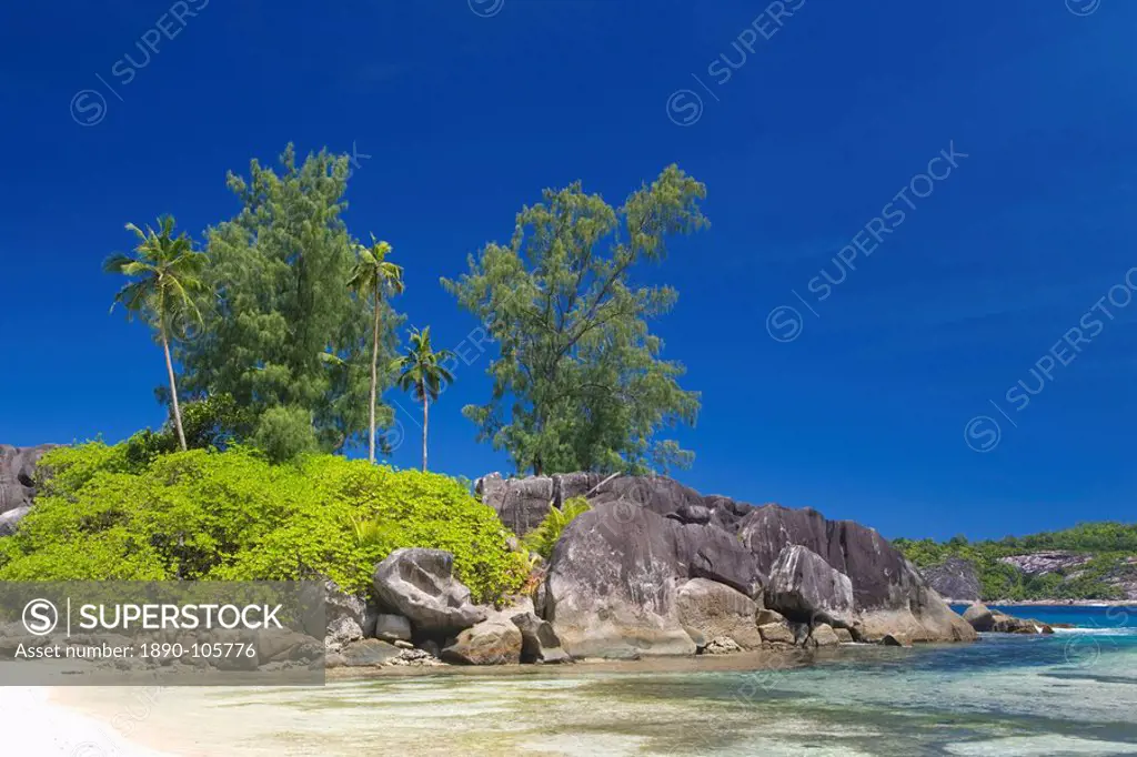 Granite outcrop on the beach, Port Glaud, Port Glaud district, Island of Mahe, Seychelles, Indian Ocean, Africa