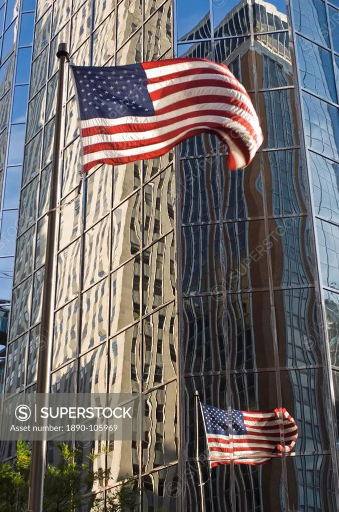 Building reflections and American flag, Oklahoma City, Oklahoma, United States of America, North America
