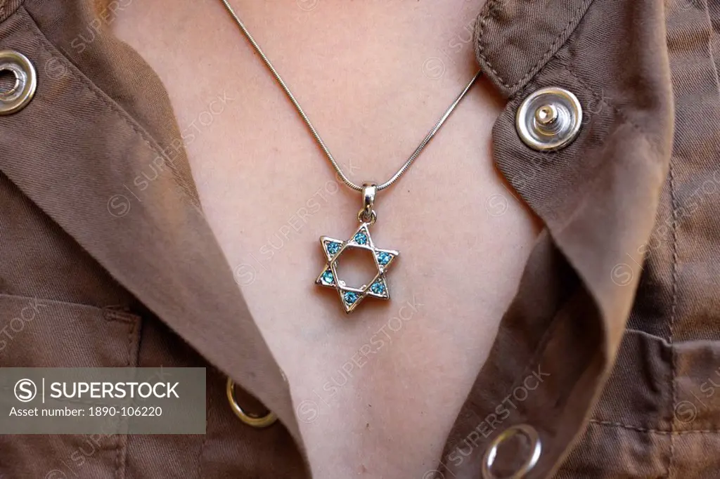 A 10_year_old girl wearing Star of David jewelry, Hertzliya, Israel, Middle East