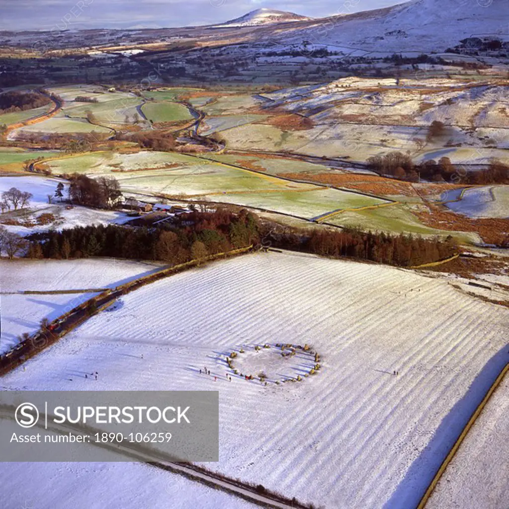 Aerial image of Castlerigg Stone Circle, a prehistoric monument in snow, near Keswick, Lake District National Park, Cumbria, England, United Kingdom, ...