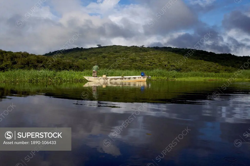 A fisherman in the everglades of Kaw, French Guiana, South America