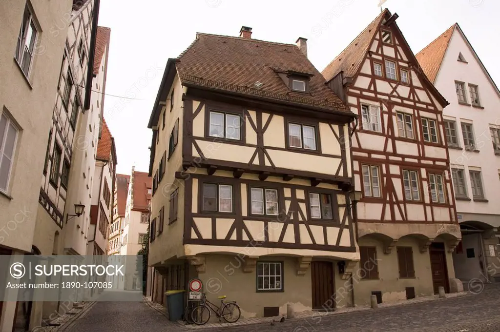Historic half_timbered houses typical of the city stand close to the Meztgerturm in Ulm, Baden_Wuerttemberg, Germany, Europe