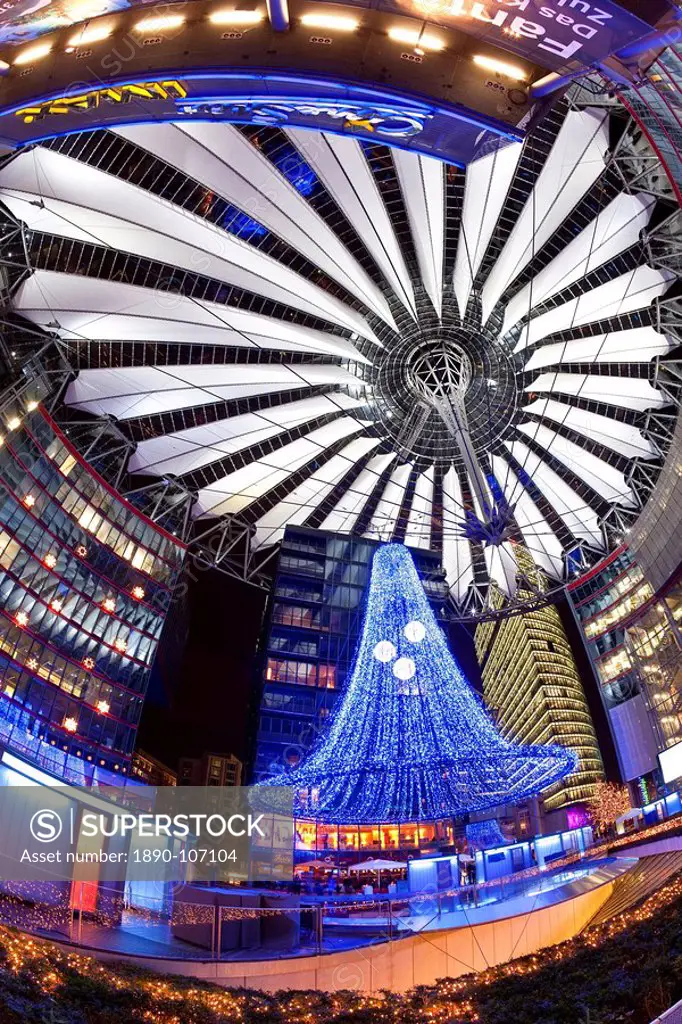 Futuristic design of the Sony Center in Potsdamer Platz, illuminated at Christmas, Berlin, Germany, Europe