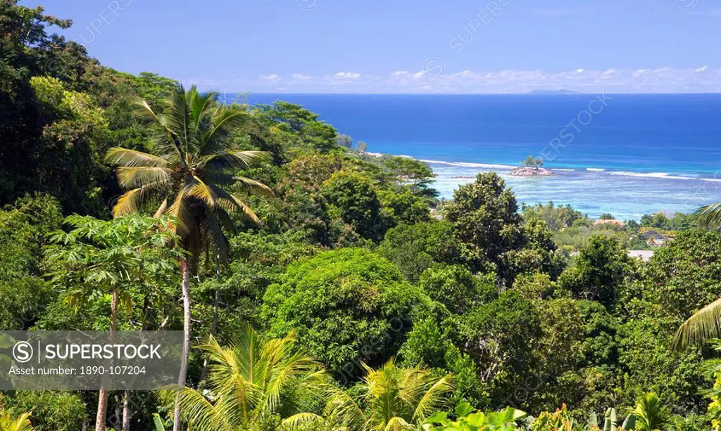 View over coast from the Jardin du Roi spice garden above Anse Royale, Anse Royale district, Island of Mahe, Seychelles, Indian Ocean, Africa