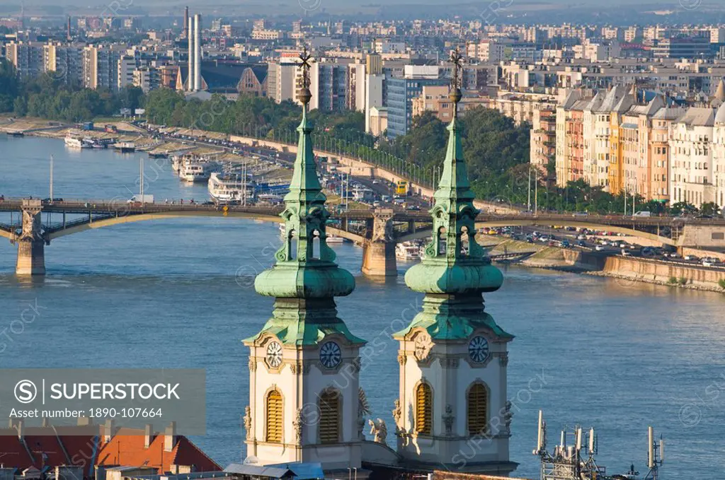 View over the River Danube with church towers in the foreground, UNESCO World Heritage Site, Budapest, Hungary, Europe