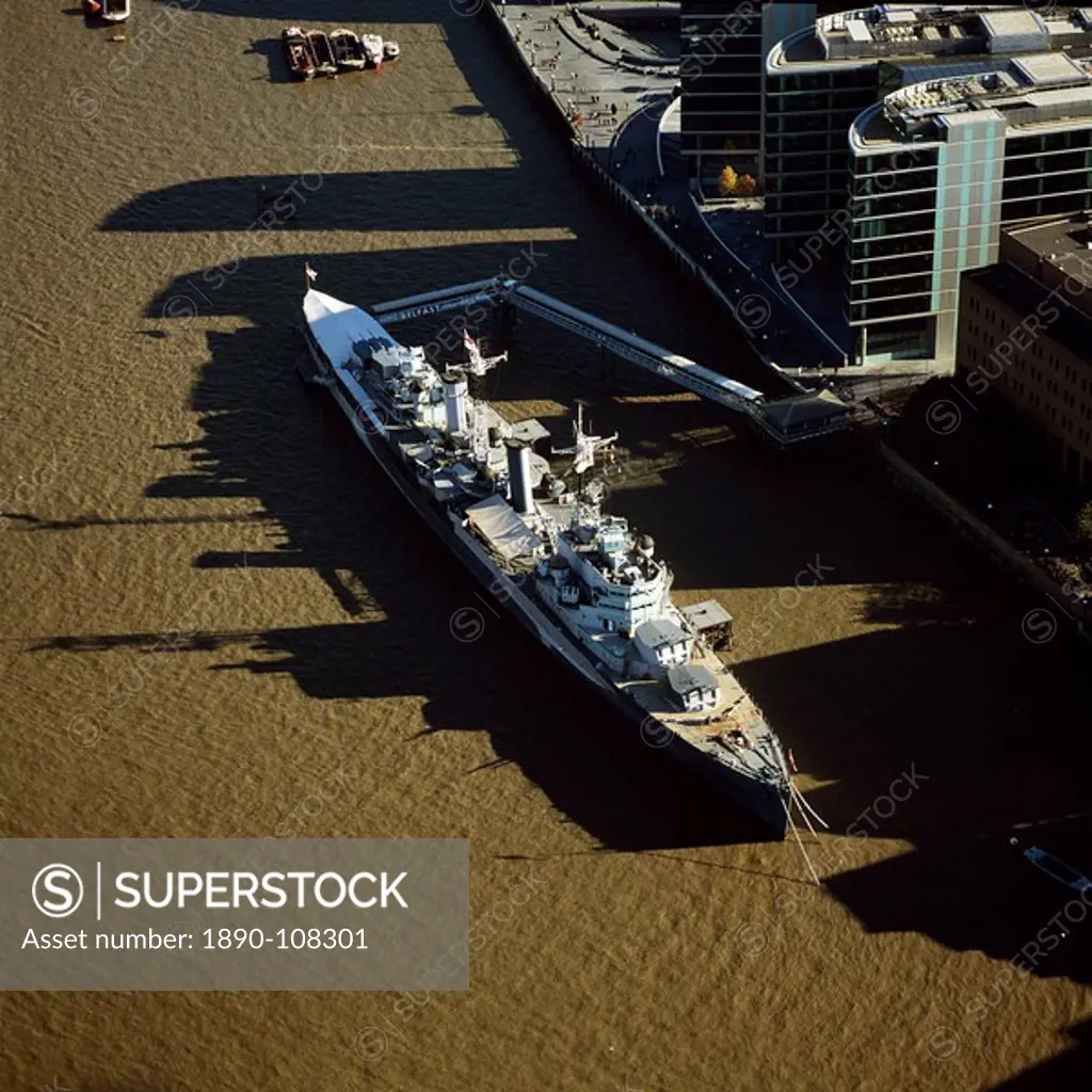 Aerial image of HMS Belfast, a Royal Navy Town_class cruiser, on the River Thames, London, England, United Kingdom, Europe