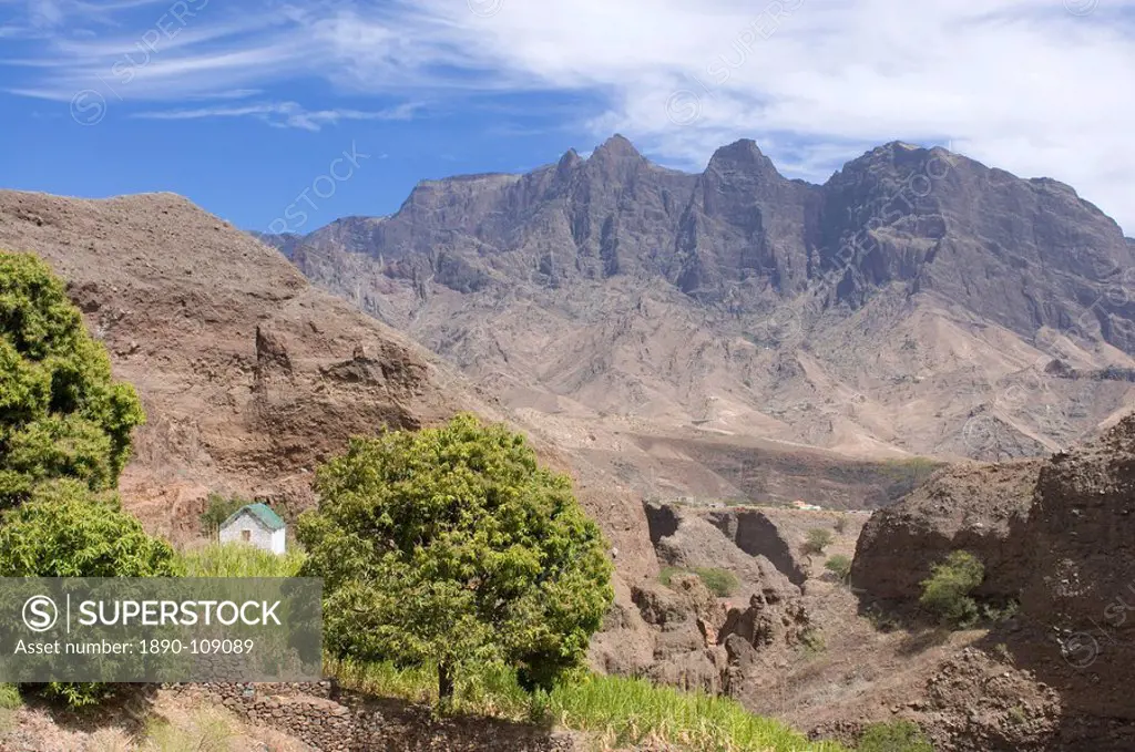 Rocks, vegetation, trees and a little house on island of San Antao, Cape Verde Islands, Africa