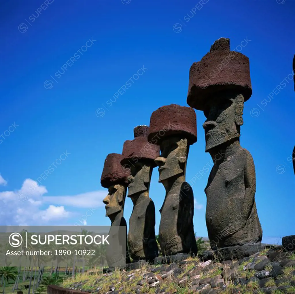 A line of moai statues, Ahu Nau Nau at Anakenu on Easter Island Rapa Nui, UNESCO World Heritage Site, Chile, South America