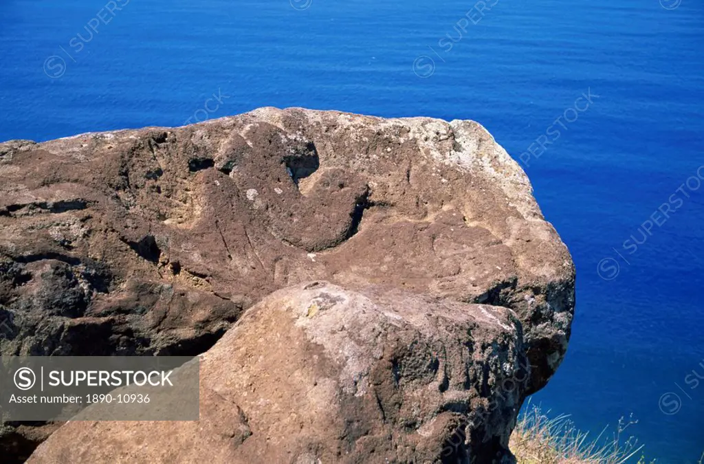 Close_up of the Bird Man petroglyph at Orongo ceremonial village on crater rim of Rano Kau on Easter Island Rapa Nui, Chile, Pacific, South America