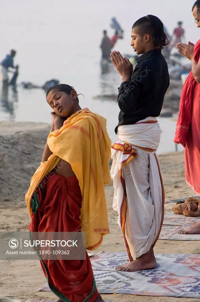 Student of a Sanskrit school sleeping during the morning prayer, Varanasi, Uttar Pradesh, India, Asia