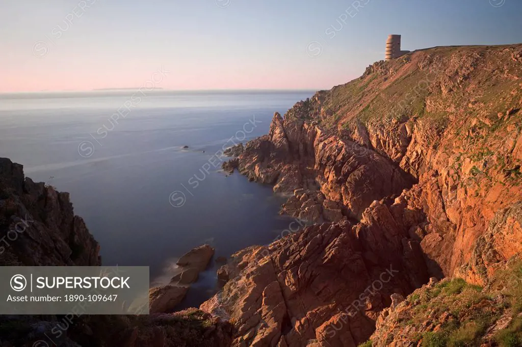 WWII German Observation tower and the rocky northwest coastline of Jersey, Channel Islands, United Kingdom, Europe
