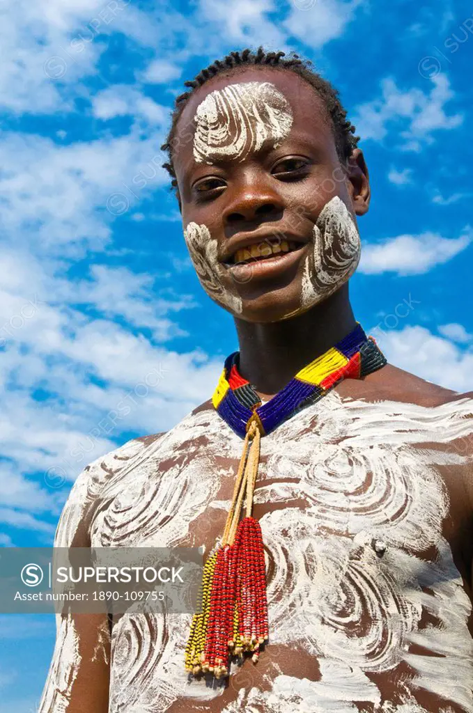 Colourful young boy from the Karo tribe, Omo Valley, Ethiopia, Africa