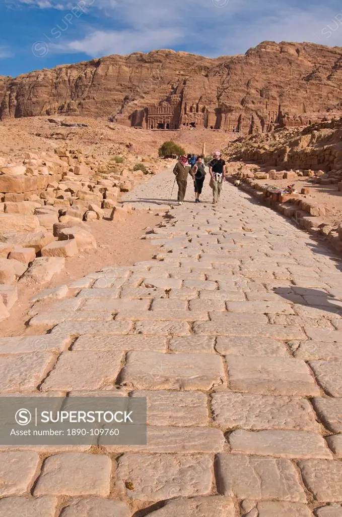 Old Roman cobbled street with view of the royal tombs, Petra, UNESCO World Heritage Site, Jordan, Middle East